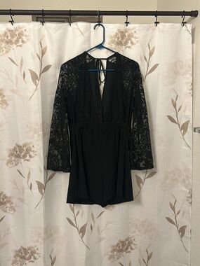 Charlotte Russe Black Lace Long Sleeve Romper with Tie Back